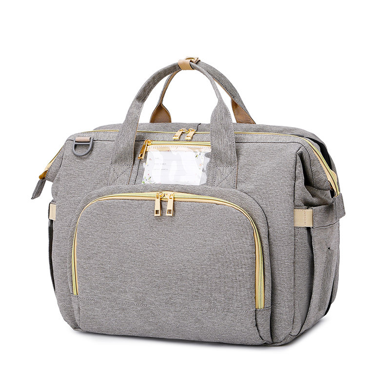 3-in-1 Wickeltasche mit tragbarem Babybett